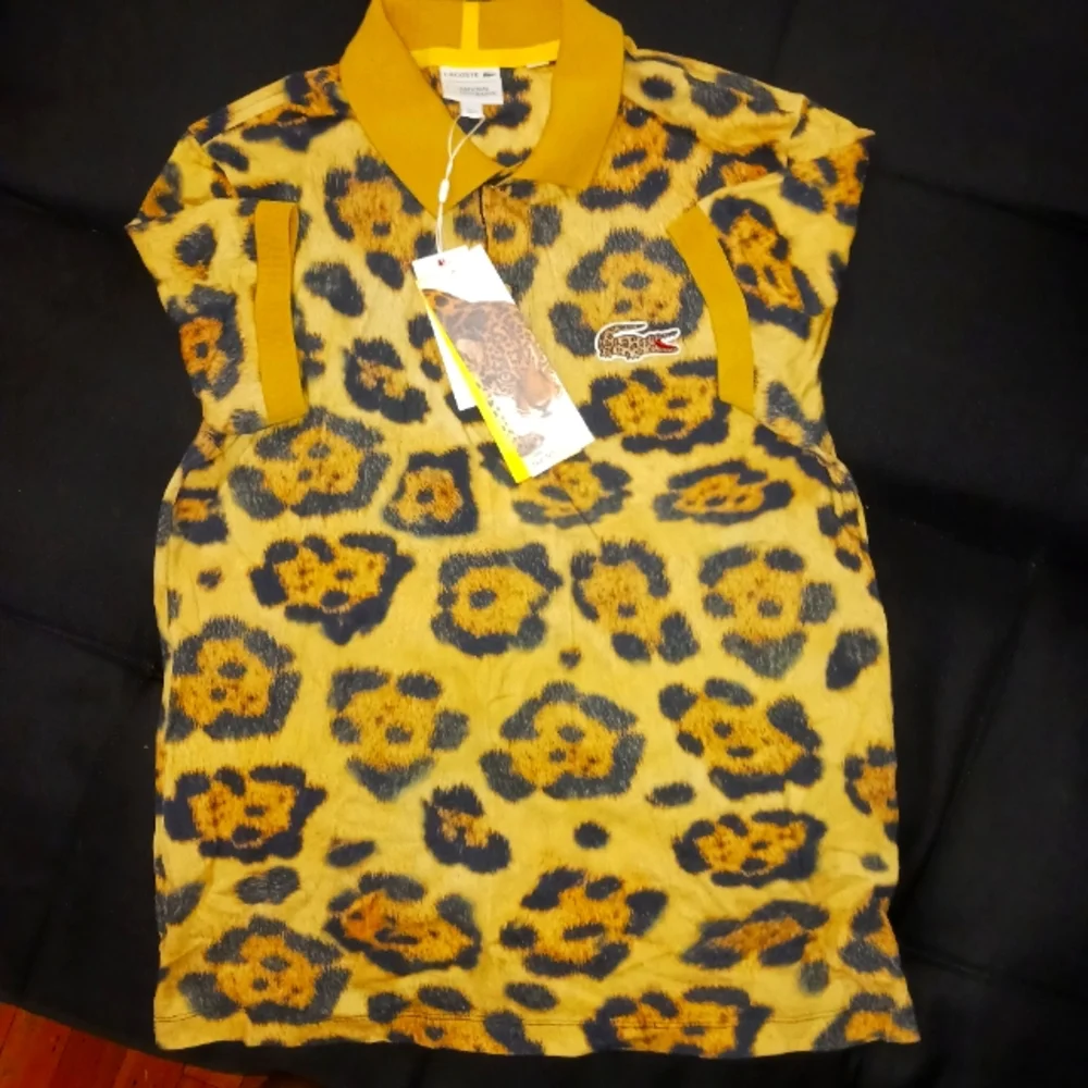 Lacoste Yellow and Black Leopard Print Polo Shirt - Picture 2 of 3